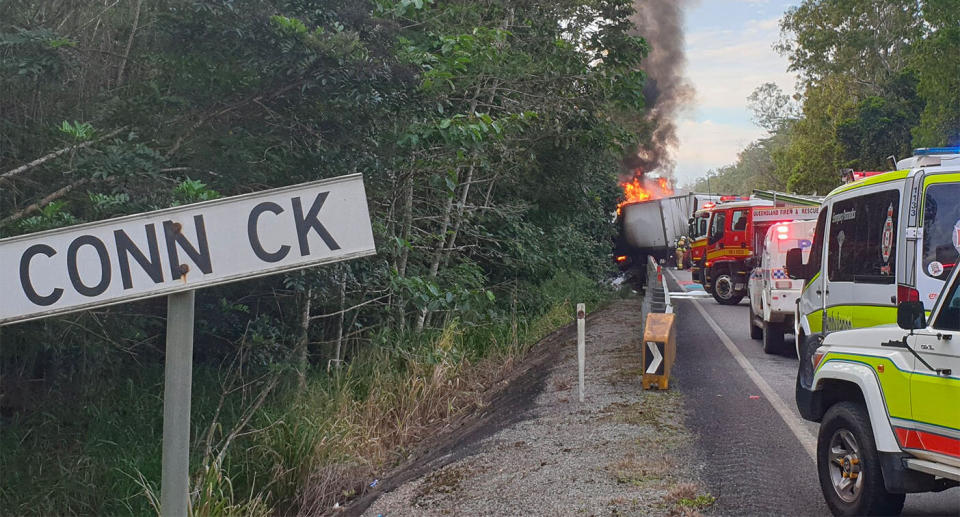 The scene from the Bruce Highway, near Caldwell, as the car collides with a truck, erupting into a fireball. Source: Twitter/Konrad Kangru