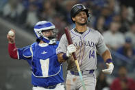 Colorado Rockies' Ezequiel Tovar (14) reacts after striking out against Toronto Blue Jays pitcher José Berríos during fifth-inning baseball game action in Toronto, Sunday, April 14, 2024. (Frank Gunn/The Canadian Press via AP)