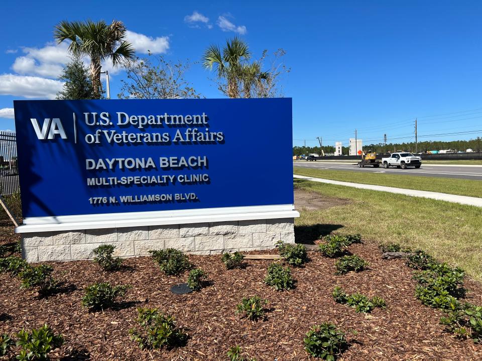 A car drives past a monument for the new VA multispecialty clinic nearing completion at 1776 N. Williamson Blvd., Daytona Beach, on Tuesday, Oct. 17, 2023. The 131,000-square-foot complex is expected to open in spring 2024. It will replace two smaller VA facilities across town at 551 National Healthcare Drive and at 1620 Mason Ave.