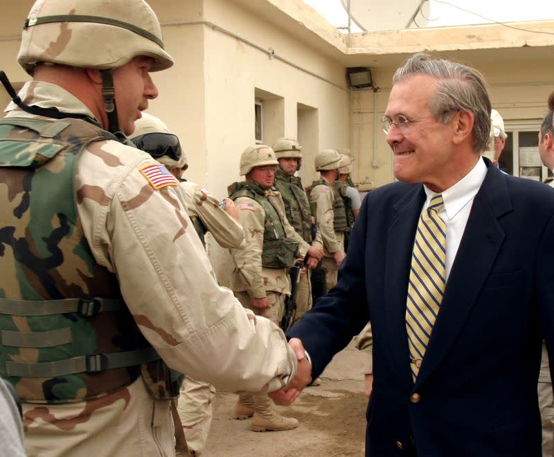 U.S. SECRETARY OF DEFENCE RUMSFELD VISITS ABU GHRAIB PRISON IN IRAQ.