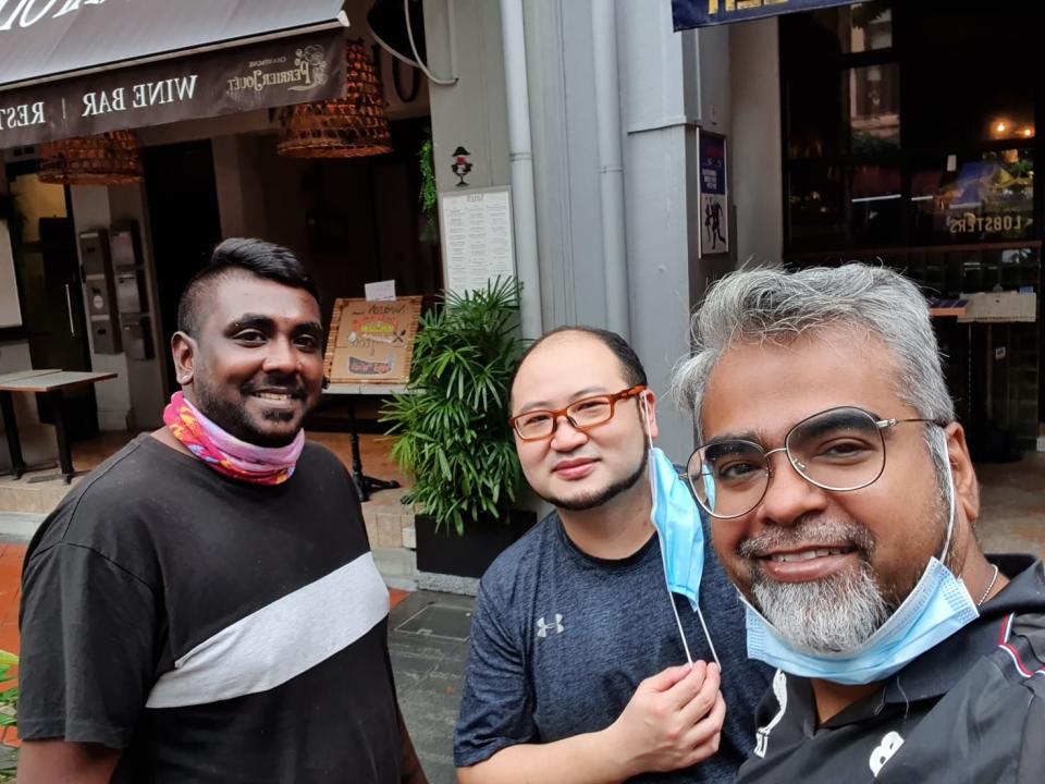 Victor Shaqur, 48, who started a food delivery service called Dropoff, with some of his riders. (PHOTO: Victor Shaqur)