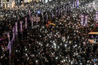 Protesters attend a Human Rights Day march in the district of Causeway Bay in Hong Kong