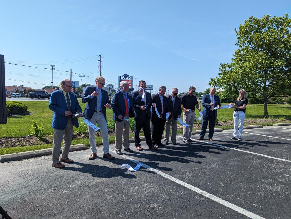 The Gateway to the Islands project was dedicated Monday. Former Senate Majority Leader Randy Gardner, R-Bowling Green, is third from left, and to his right is Ohio Department of Transportation District 2 deputy director Pat McColley.