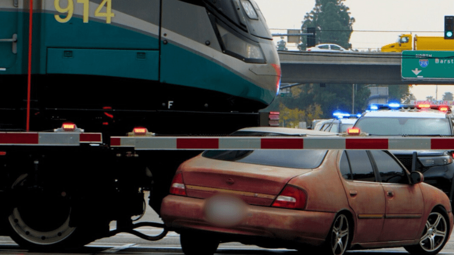 A driver was uninjured after nearly being crushed by a Metrolink train in San Bernardino.