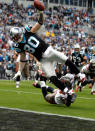 Jeremy Shockey #80 of the Carolina Panthers dives for a touchdown against Ahmad Black #43 of the Tampa Bay Buccaneers during their game at Bank of America Stadium on December 24, 2011 in Charlotte, North Carolina. (Photo by Streeter Lecka/Getty Images)