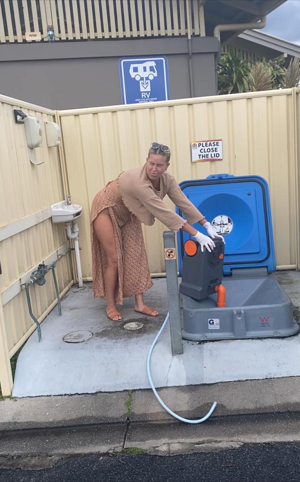 Brooke, pictured in white gloves, seen emptying the toilet at a Byron Bay 'dumping point'.