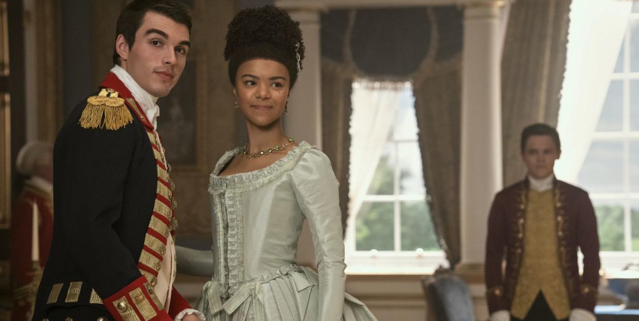 queen charlotte a bridgerton story l to r corey mylchreest as young king george, india amarteifio as young queen charlotte, sam clemmett as young brimsley in episode 106 of queen charlotte a bridgerton story cr nick wallnetflix © 2023