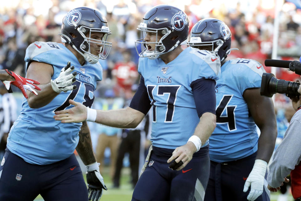 Tennessee Titans quarterback Ryan Tannehill (17) celebrates with offensive tackle Jack Conklin (78) after Tannehill scored a 2-point conversion against the Kansas City Chiefs in the second half of an NFL football game Sunday, Nov. 10, 2019, in Nashville, Tenn. The Titans won 35-32. (AP Photo/James Kenney)