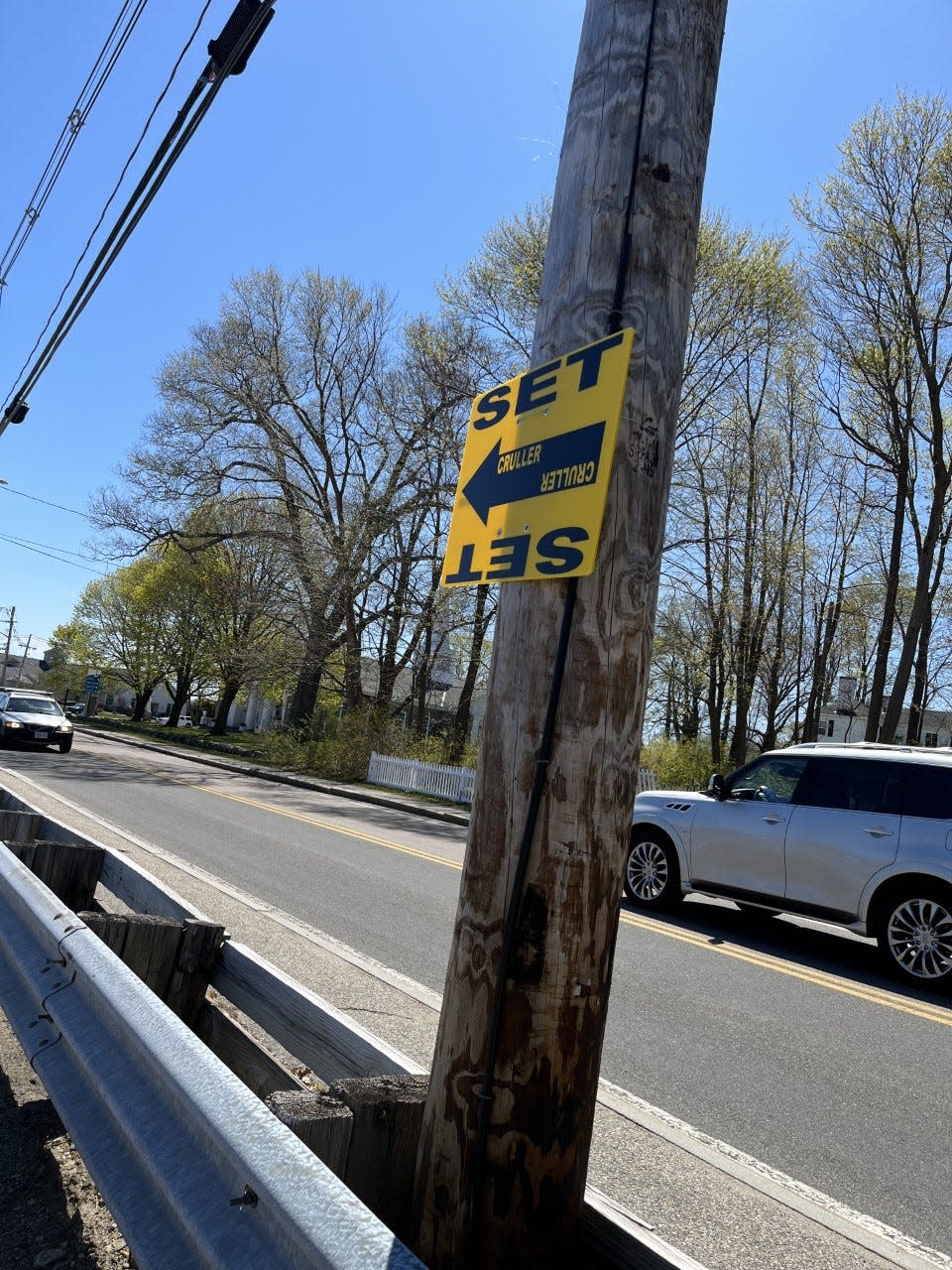 A sign points toward the set of "Finestkind," a crime thriller being shot in Scituate, on Saturday, April 30, 2022.