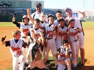 Trace Evans, in the back row in glasses, turned plenty of heads with 11 straight home runs — Facebook