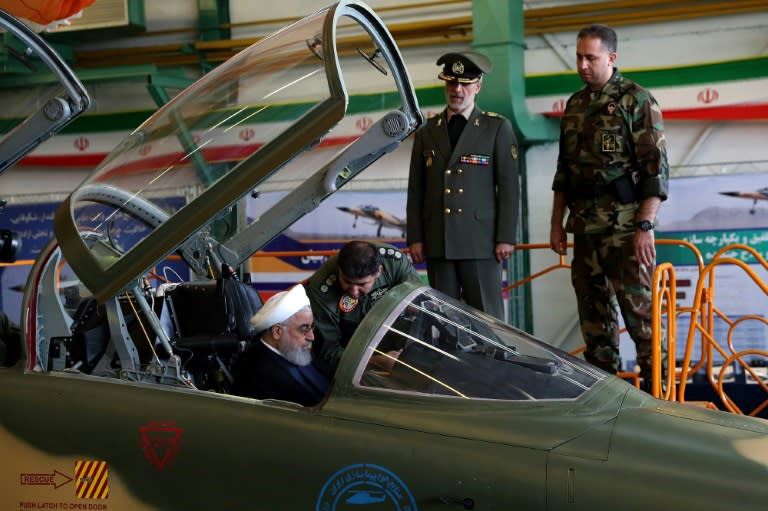 President Hassan Rouhani sits in the cockpit of Iran's new "Kowsar" domestic fighter jet