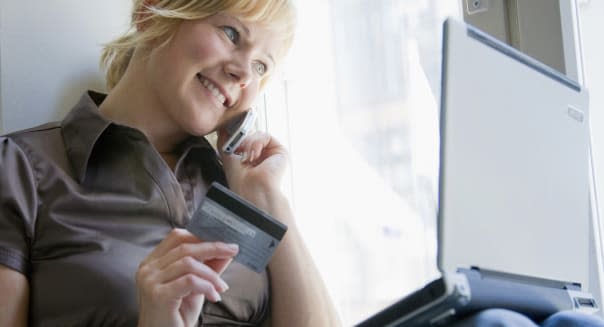 Girl with computer and credit card