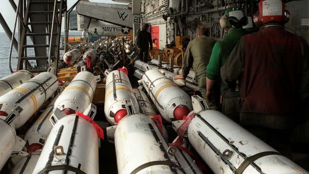 PHOTO: In this March 22, 1986, file photo, U.S. Navy aviation ordnancemen stage Mark 20 Rockeye II cluster bombs aboard an aircraft carrier in the Mediterranean Sea in this U.S. Navy handout photo. (US Navy via Reuters, FILE)