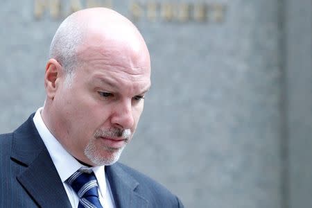 FILE PHOTO: James Gatto, Adidas director of global sports marketing, exits the Manhattan Federal Courthouse, following an appearance for bribery and fraud charges in connection with college basketball recruiting, in New York, U.S., October 12, 2017. REUTERS/Brendan McDermid