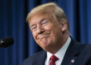 President Donald Trump smiles as he speaks to members of the National Border Patrol Council at the White House in Washington, Friday, Feb. 14, 2020. (AP Photo/J. Scott Applewhite)