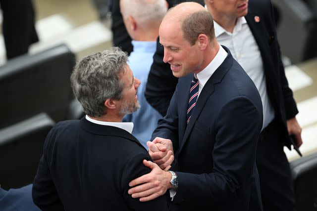 <p>Matthias Hangst/Getty</p> King Frederik and Prince William at the UEFA EURO 2024 soccer match between Denmark and England at Frankfurt Arena on June 20, 2024