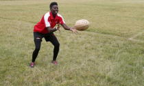 Kenya Women's Rugby team player Camilla Cynthia catches the ball during a light training session at the RFUEA grounds in the capital Nairobi, April 4, 2016. REUTERS/Thomas Mukoya