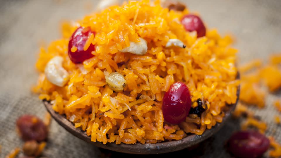 A brightly colored sweet rice that's a Pakistani favorite. - Shutterstock