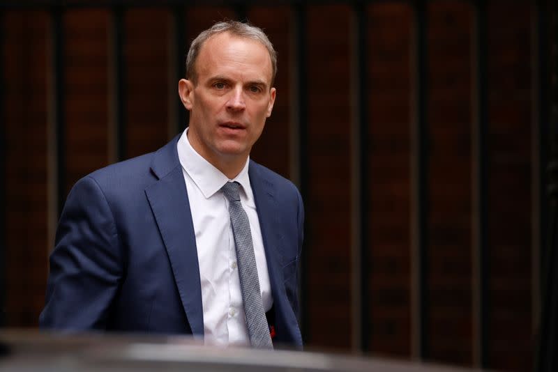 Britain's Foreign Secretary Raab walks outside Downing Street in London