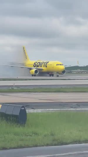 Spirit Airlines flight from Florida catches fire after landing in