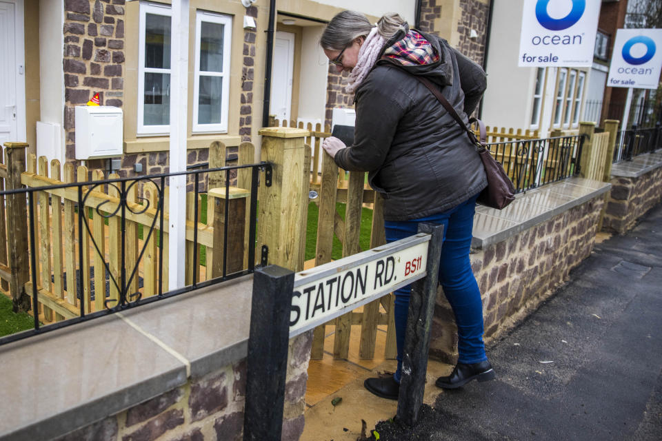 The entrance to one of the homes in Shirehampton, Bristol, has been built behind the existing Station Road street sign, which is now completely blocking the gate (swns)