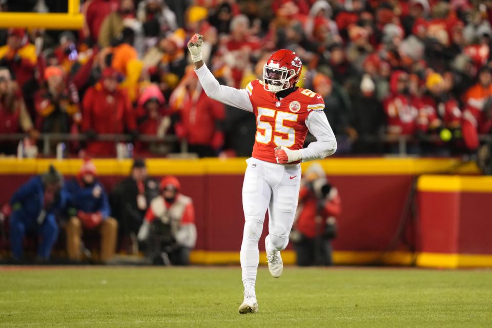 Kansas City Chiefs defensive end Frank Clark celebrates after a sack against the Cincinnati Bengals during the first quarter of the AFC Championship game at GEHA Field at Arrowhead Stadium.