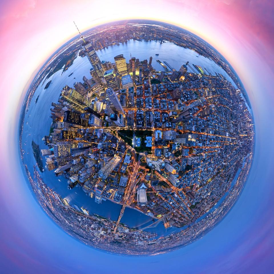 <p>In all of the works, the bright lights of New York glitter across the skyline, making its skyscrapers and life below pop. Andrew Griffiths, who has been working as an aerial photographer for the past 16 years, captured the unique photography series. (Photo: Andrew Griffiths/Lensaloft/Caters) </p>