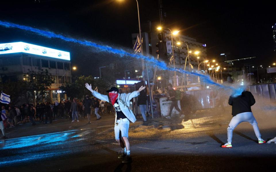 Tens of thousands of protesters marched through Israel's streets on Monday - GETTY IMAGES