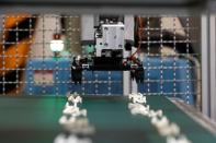 A machine makes plastic parts at the Simon Manufacturer of Plastic Products in Koszarhegy