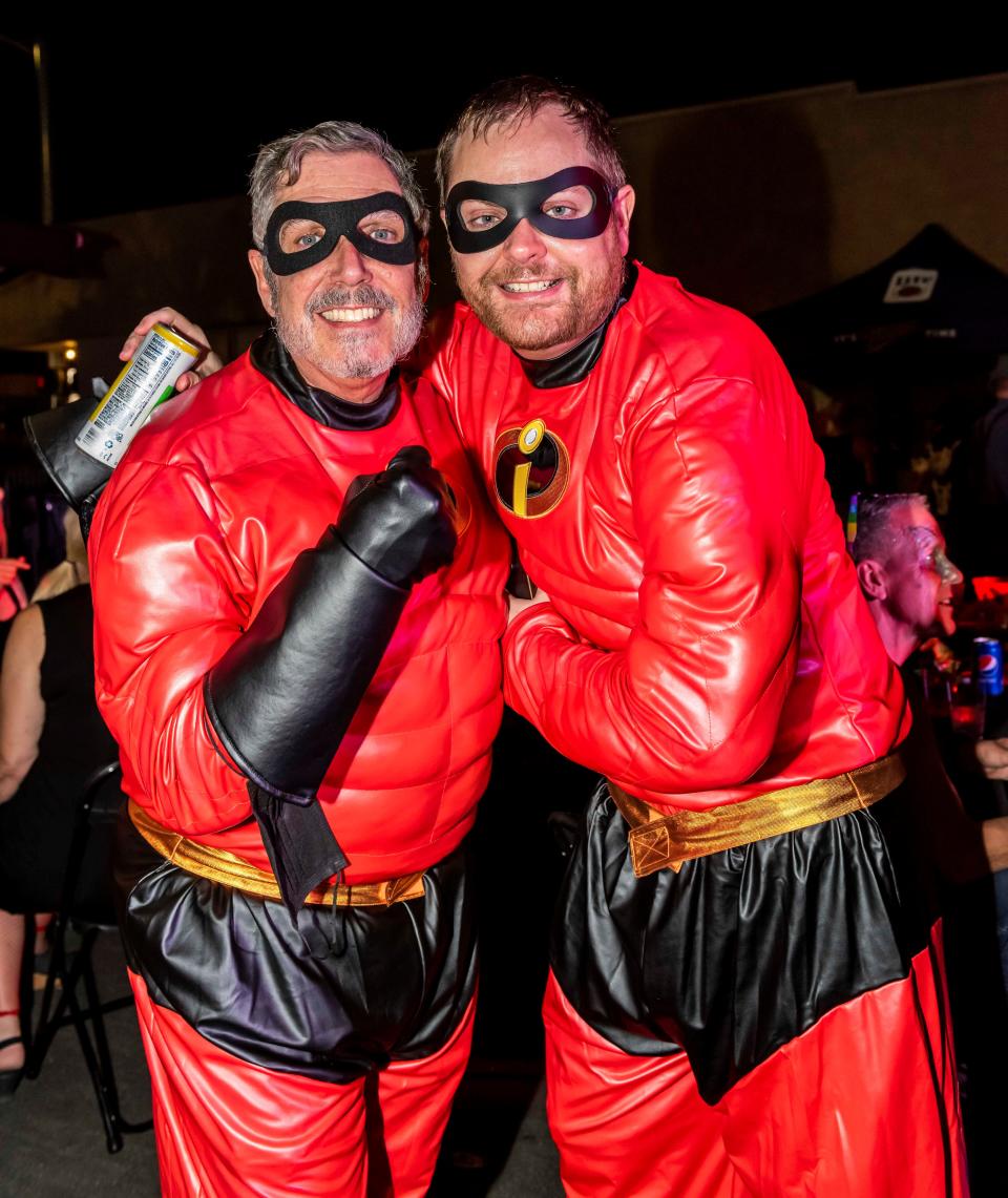Wonder Twin powers activate! Two superheroes join forces at Halloween Palm Springs 2021.