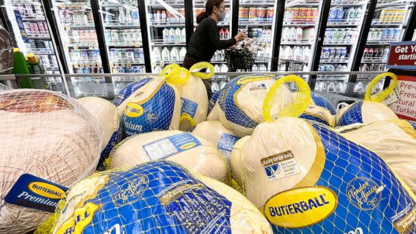 PHOTO: A shopper walks past turkeys displayed for sale in a grocery store ahead of the Thanksgiving holiday on Nov. 11, 2021, in Los Angeles. (Mario Tama/Getty Images, FILE)