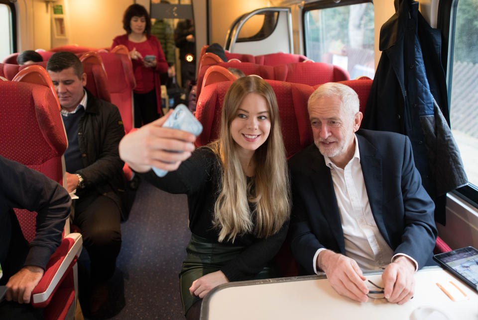 Labour Party leader Jeremy Corbyn meets a supporter on a train on his return from a visit to Sheffield, South Yorkshire, while on the General Election campaign trail.