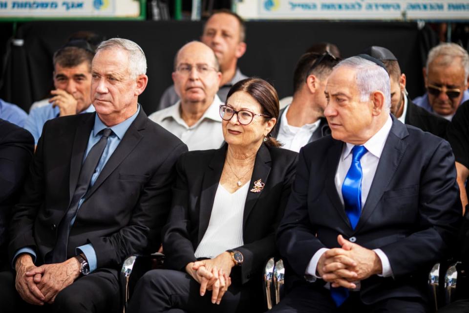 <div class="inline-image__caption"><p>(L-R) Leader of Blue and white party Benny Gantz, Chief Justice of the Supreme Court of Israe Esther Hayut, and Israeli Prime Minister Benjamin Netanyahu attend a memorial ceremony for late Israeli President Shimon Peres at Mount Herzl. </p></div> <div class="inline-image__credit">Ilia Yefimovich/picture alliance via Getty Images</div>