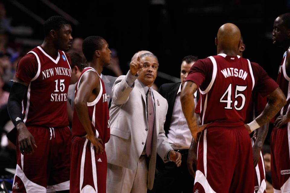 Head coach Marvin Menzies of the New Mexico State Aggies reacts during a timeout in the first half while taking on Indiana Hoosiers in the second round of the 2012 NCAA men's basketball tournament at Rose Garden Arena on March 15, 2012 in Portland, Oregon.