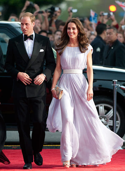 <div class="caption-credit"> Photo by: Getty Images</div><div class="caption-title">Middleton in Alexander McQueen at the BAFTA Brits to Watch event in Los Angeles, July 2011</div>Ever since Middleton wore a breathtaking Alexander McQueen gown on her wedding day, the Duchess has opted to wear McQueen designs for many big events. Here the Duchess accessorized her lilac dress with a clutch and sandals from London-based Malaysian designer Jimmy Choo. <br>