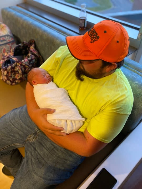 Chase Bush with his new son Waylon. (Credit: Ambra Bush)