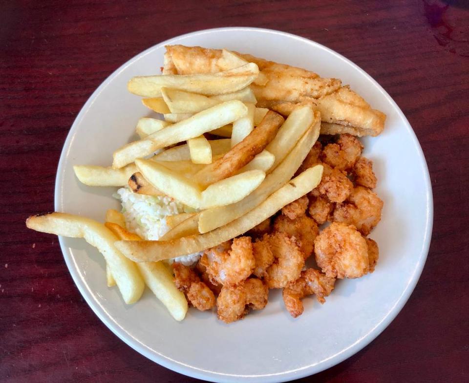 The lunch special at Beck’s Restaurant in Calabash, NC: flounder, shrimp, french fries and coleslaw. Calabash-style fried fish can be found in North and South Carolina and beyond. August 2, 2023.