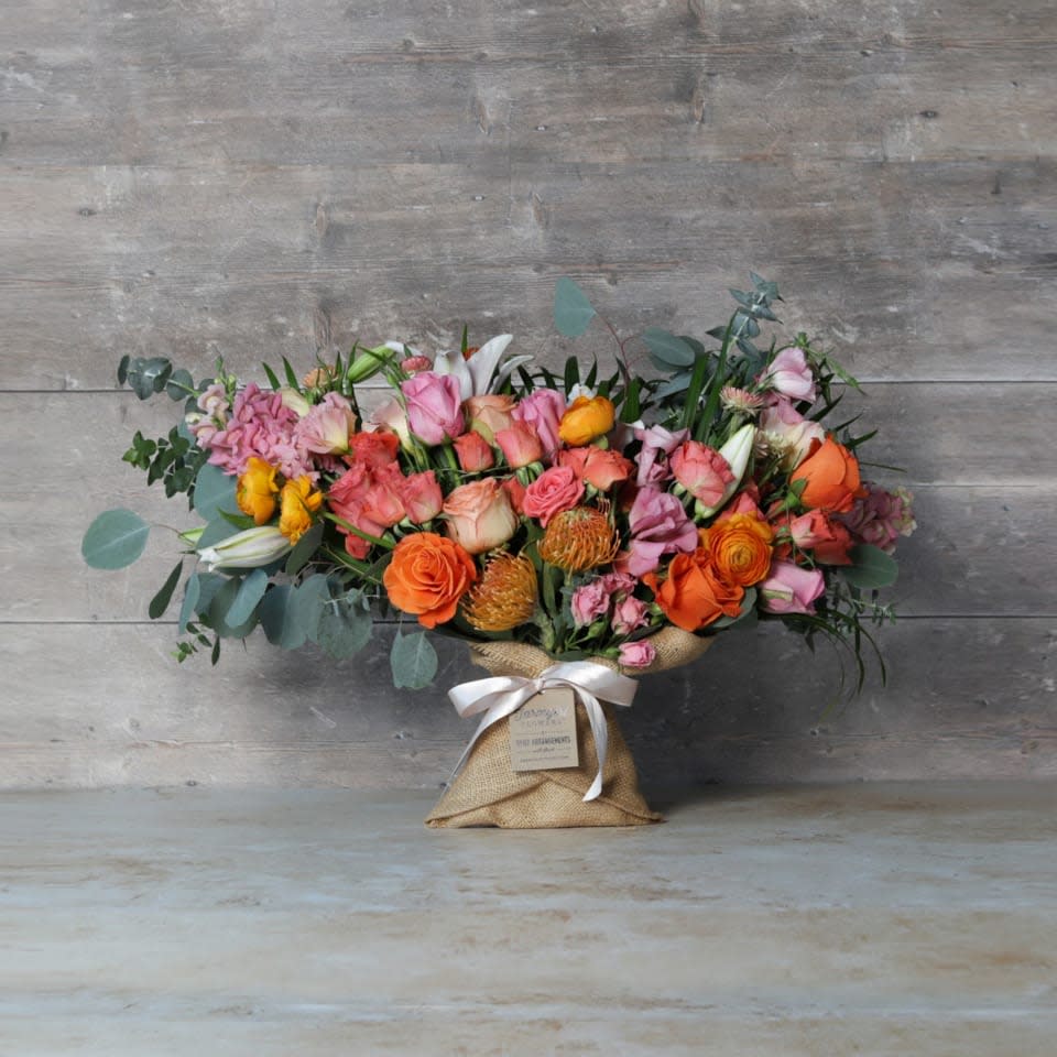 <p><a href="https://farmgirlflowers.com/big-love-burlap-wrapped-bouquet" rel="nofollow noopener" target="_blank" data-ylk="slk:Shop Now;elm:context_link;itc:0;sec:content-canvas" class="link rapid-noclick-resp">Shop Now</a></p><p>Big Love Burlap Wrapped Bouquet</p><p>farmgirlflowers.com</p><p>$99.00</p><span class="copyright">Farmgirl Flowers</span>