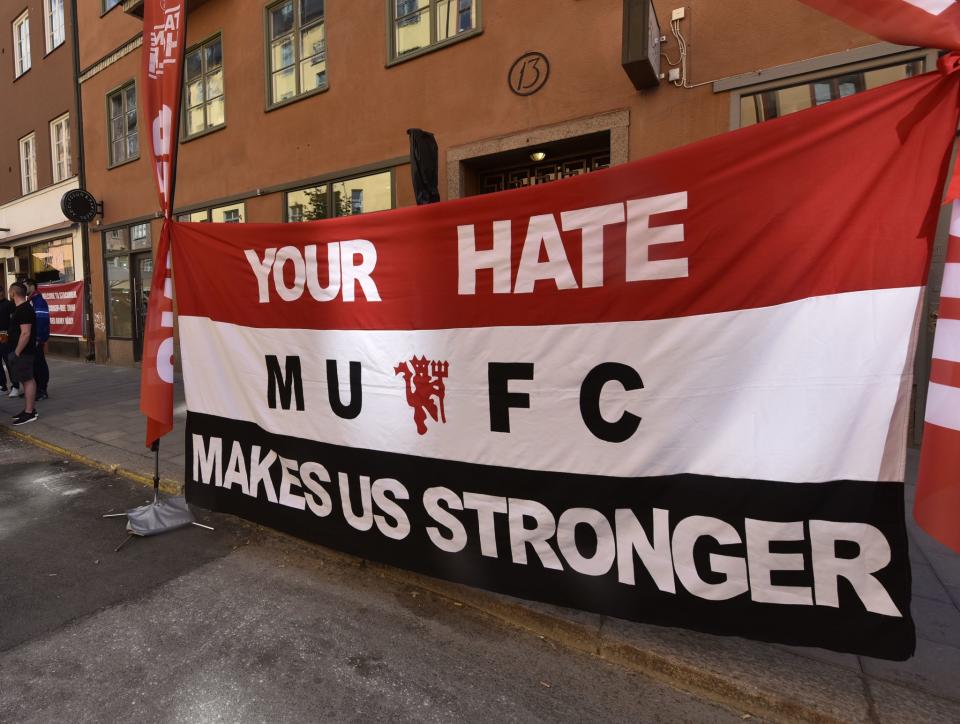 <p>A banner by Manchester United fans for the victims of the Manchester terror attack on May 22, reads: ‘your hate makes us stronger’ in the streets of Stockholm, Sweden, prior the Europa League final against Ajax Amsterdam on Wednesday, May 24, 2017. (AP Photo/Martin Meissner) </p>