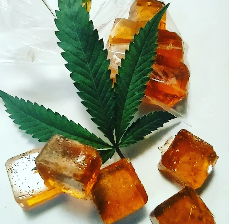 A handful of Peach Lemonade Feco Lozenges made with marijuana by Farrah Garrison.