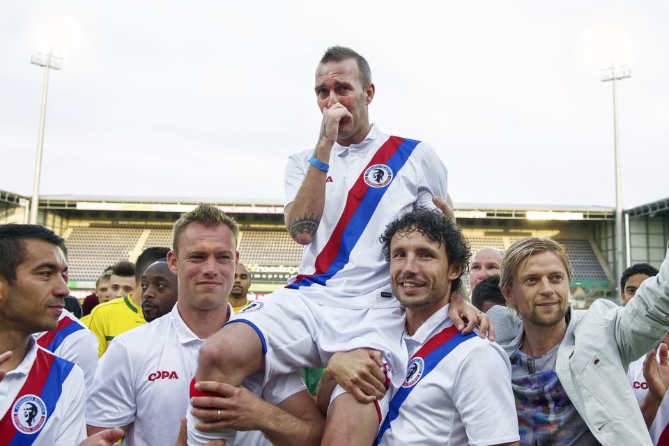 (L-R) Giovanni van Bronckhorst of Team Fernando Ricksen, Kiki Musampa of Team Fernando Ricksen, Kevin Hofland of Team Fernando Ricksen, Fernando Ricksen of Team Fernando Ricksen, Mark van Bommel of Team Fernando Ricksen, Anatoliy Tymoshchuck of Team Fernando Ricksen during the Fernando Ricksen benefit game on May 25, 2014 at the Trendwork Arena in Sittard, The Netherlands.(Photo by VI Images via Getty Images)