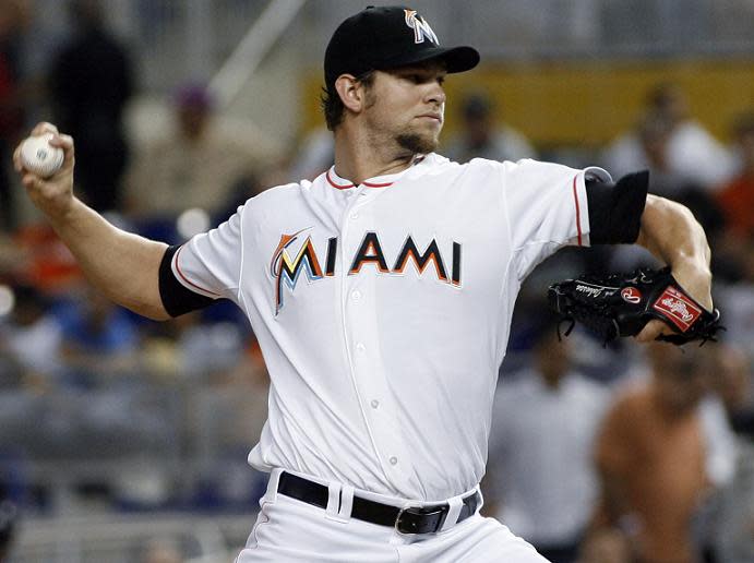 Josh Johnson pitches for the Miami Marlins in 2012. He's attempting a comeback with the San Francisco Giants. (AP)