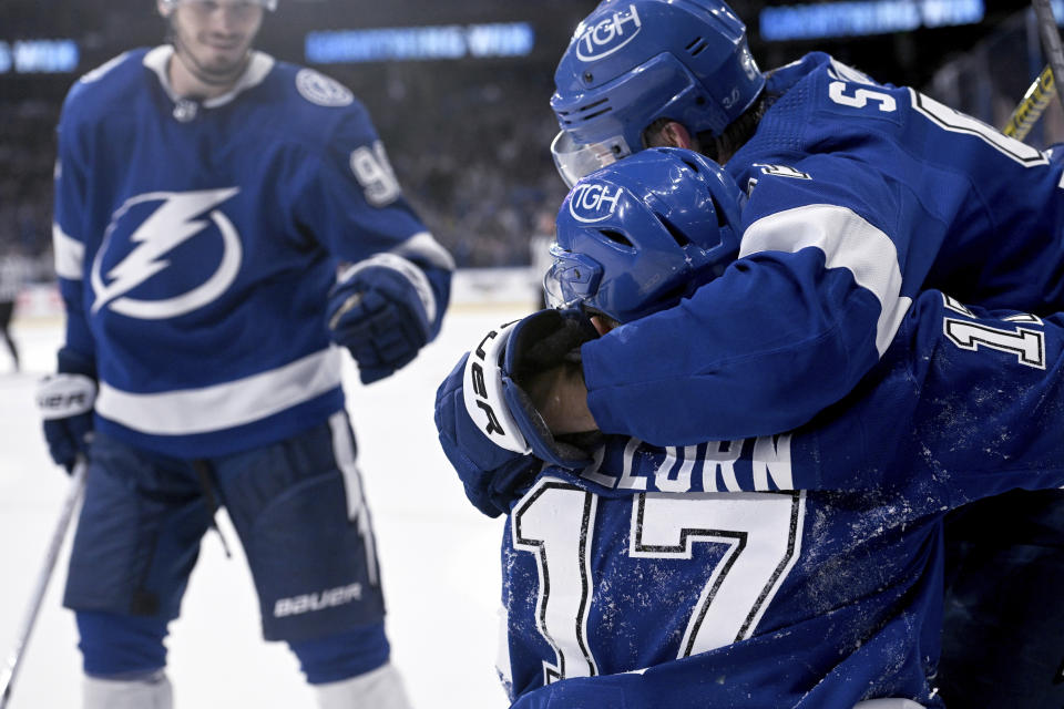 Tampa Bay Lightning center Steven Stamkos (91) and left wing Alex Killorn (17) celebrate Killorn's overtime goal against the Dallas Stars in an NHL hockey game Tuesday, Nov. 15, 2022, in Tampa, Fla. (AP Photo/Jason Behnken)