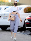 <p>Jessie J heads to meet a friend for dinner in Los Angeles wearing a crop top and flowy pants on Thursday.</p>