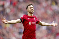 Liverpool's Diogo Jota celebrates scoring during the English Premier League soccer match between Liverpool and Burnley at Anfield, Liverpool, England, Saturday Aug. 21, 2021. (Mike Egerton/PA via AP)