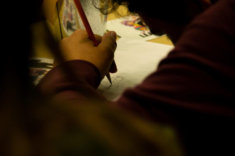 Matthew Martinez, a 13-year-old student from Gillett Middle School in Kingsville, follows drawing instructions given from manga illustrator Misako Rocks at the eighth Teen Bookfest By the Bay at American Bank Center Saturday, Feb. 4, 2023.