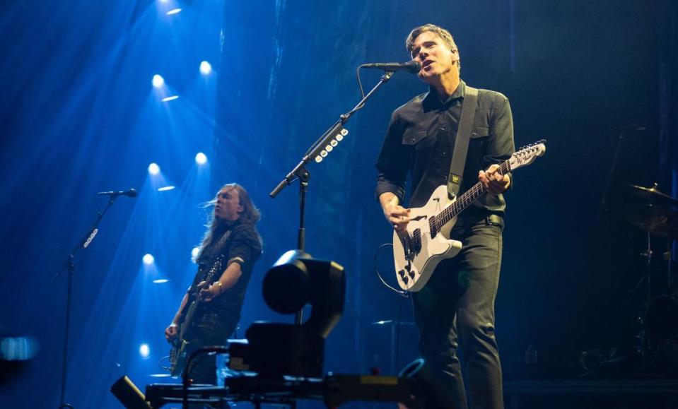 Jimmy Eat World lead vocalist and lead guitarist Jim Adkins, center, and bassist Rick Burch open for Fall Out Boy on Sunday, March 4, 2024, at Golden 1 Center.