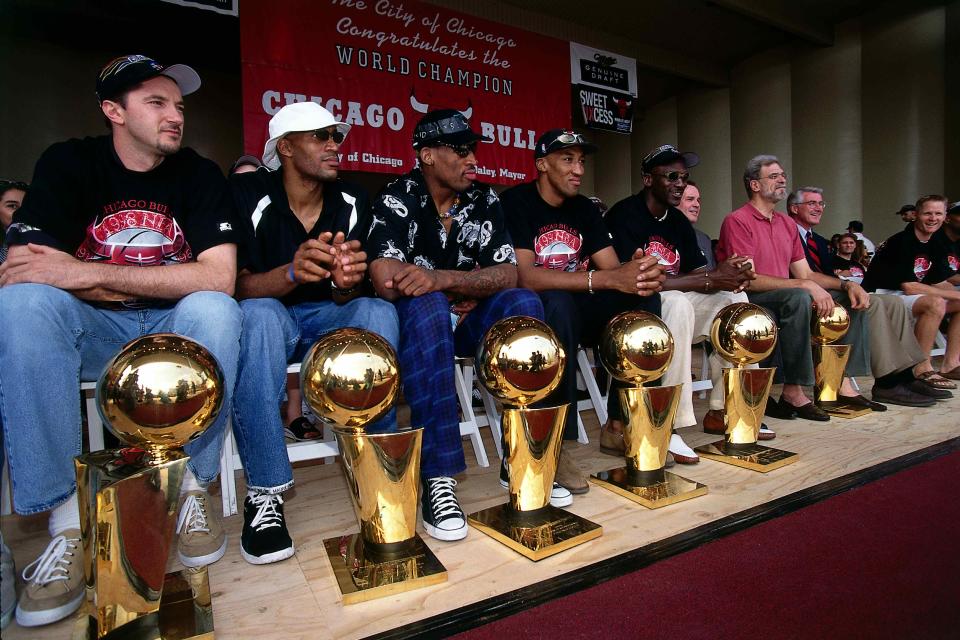 The Bulls display their six championship trophies. (Getty Images)