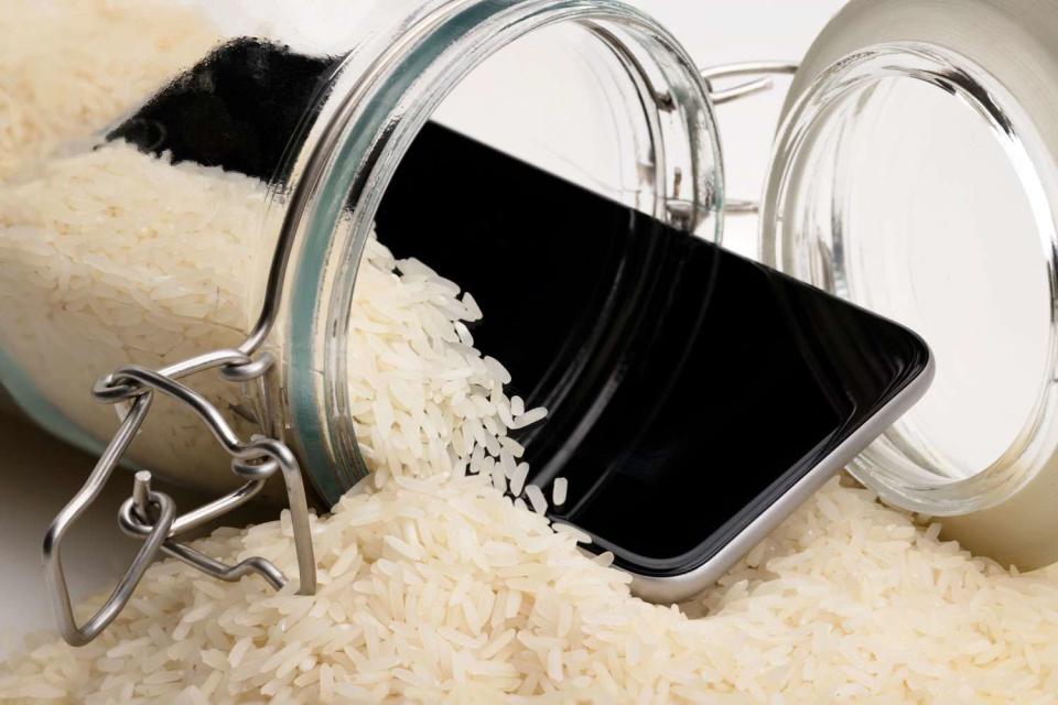 <p>Getty</p> iPhone drying in rice.