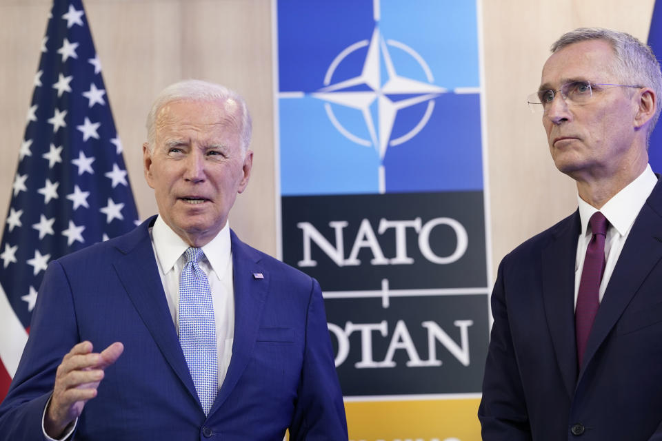 U.S. President Joe Biden, left, and NATO Secretary General Jens Stoltenberg give remarks at the NATO summit in Vilnius, Lithuania, Tuesday, July 11, 2023. Russia's war on Ukraine will top the agenda when NATO leaders meet in the Lithuanian capital Vilnius on Tuesday and Wednesday. (AP Photo/Susan Walsh)